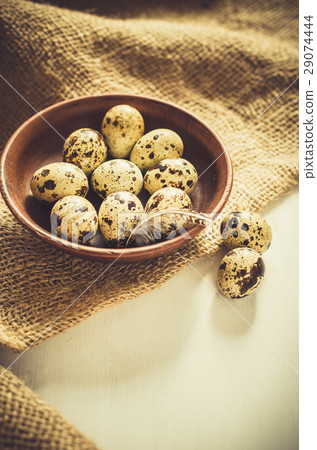 Fresh Organic Quail Eggs in a Ceramic Bowl. 29074444
