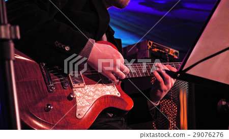 Guitar player on the stage Guitar player on the stage 29076276
