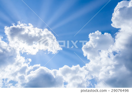 sun rays breaking through the clouds on blue sky sun rays breaking through the clouds on blue sky 29076496