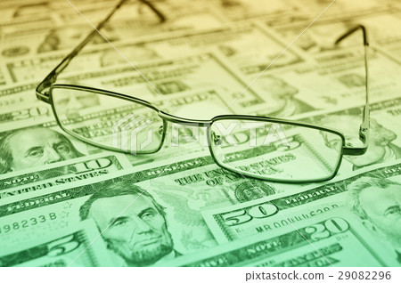 Glasses on dollar, financial and business concept 29082296