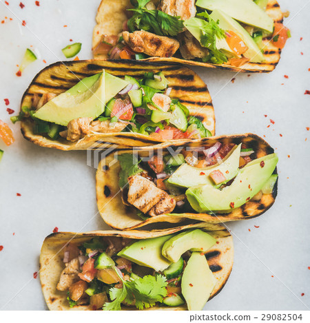 Healthy corn tortillas with grilled chicken fillet Healthy corn tortillas with grilled chicken fillet 29082504