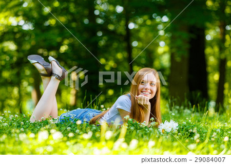 Beautiful smiling red-haired young woman Beautiful smiling red-haired young woman 29084007