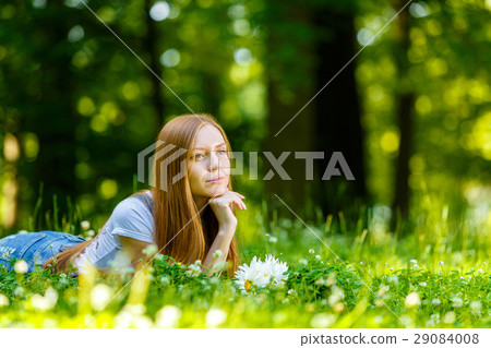 Beautiful smiling red-haired young woman Beautiful smiling red-haired young woman 29084008