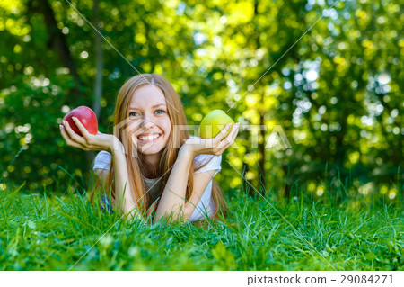 Beautiful smiling red-haired young woman Beautiful smiling red-haired young woman 29084271