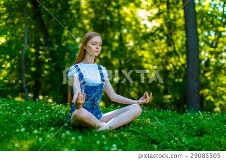 Beautiful smiling red-haired young woman Beautiful smiling red-haired young woman 29085505