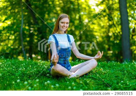 Beautiful smiling red-haired young woman 29085515