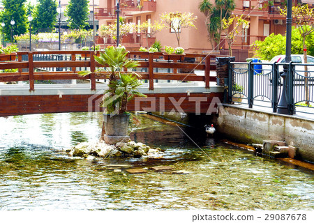 Pedestrian bridge across the river Pedestrian bridge across the river 29087678