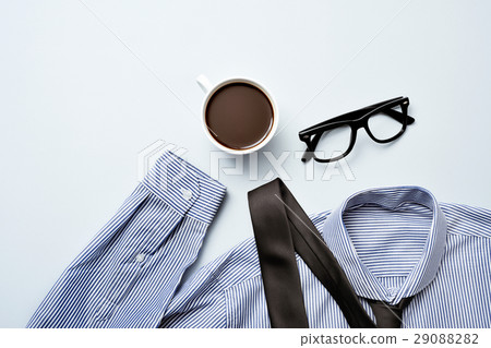 coffee, eyeglasses, tie and shirt coffee, eyeglasses, tie and shirt 29088282