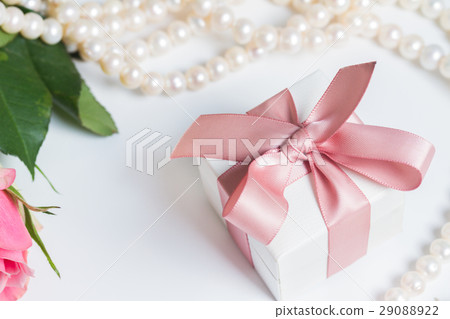 Box with pink ribbon Box with pink ribbon 29088922