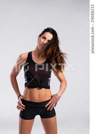 Fitness woman in black tank top and shorts, studio Fitness woman in black tank top and shorts, studio 29089215
