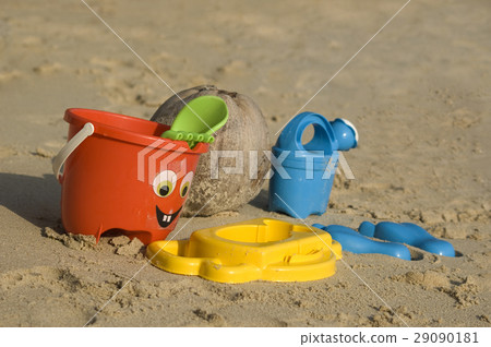 Plastic kids toys on the sand beach Plastic kids toys on the sand beach 29090181