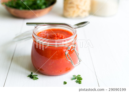 Tomato Sauce In Jar On White Wooden Table Tomato Sauce In Jar On White Wooden Table 29090199