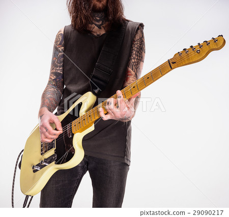 Guitarist plays guitar. Guitarist plays guitar. 29090217