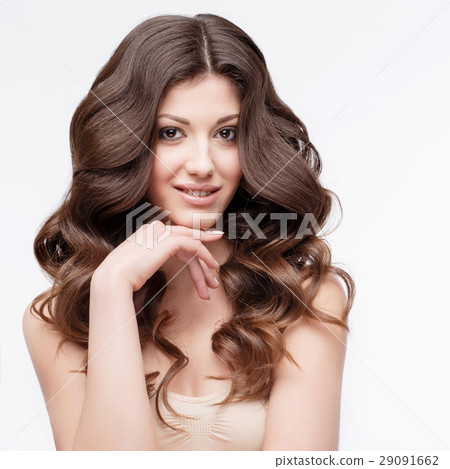 Beautiful Woman with curly brown hair 29091662