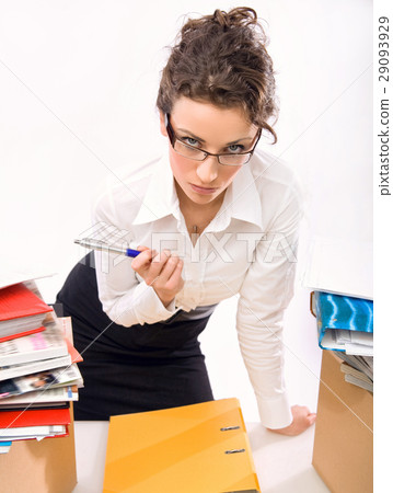 Young serious employee in the office Young serious employee in the office 29093929