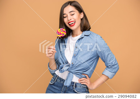 The young woman with colorful lollipop 29094082