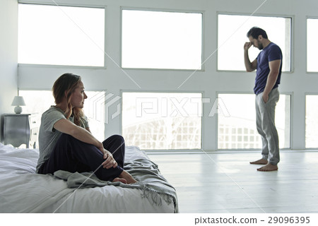 Frustrated husband and wife in room 29096395