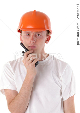 workman talking on portable UHF radio transceiver 29096551