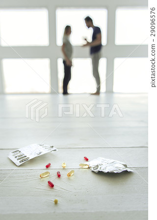 Various pills at light floor 29096576