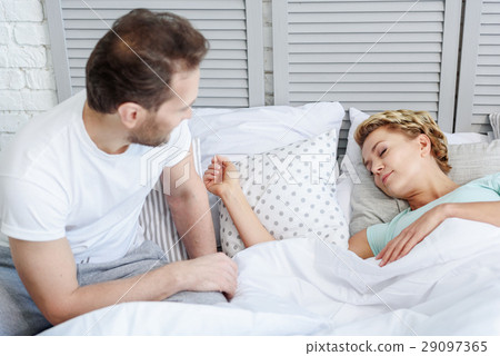 Cheerful husband guarding a female dream 29097365