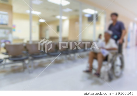 Abstract photo blurred of hospital background, Patient sitting chair with waiting seat for see doctor. Abstract photo blurred of hospital background, Patient sitting chair with waiting seat for see doctor. 29103145