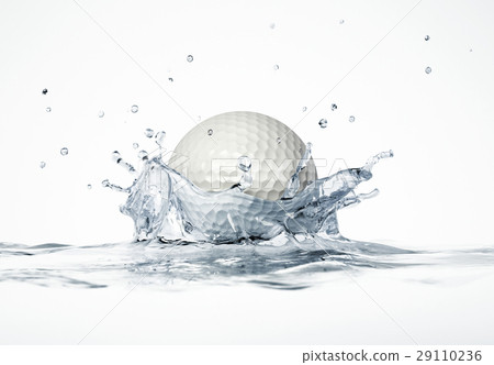 White golf ball splashing into water, forming a crown splash. 29110236