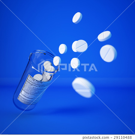Group of white medicine pills, jumping out of the transparent open jar. 29110488