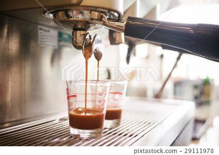 coffee machine preparing espresso and pouring  29111978