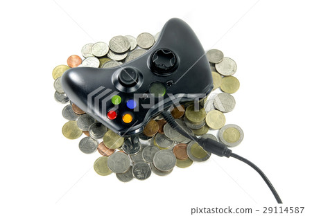 game controller on a thai money coins game controller on a thai money coins 29114587