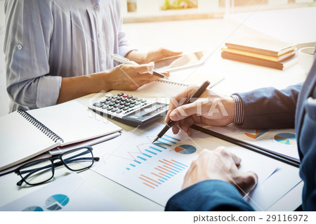 business man financial inspector and secretary making report, ca business man financial inspector and secretary making report, ca 29116972