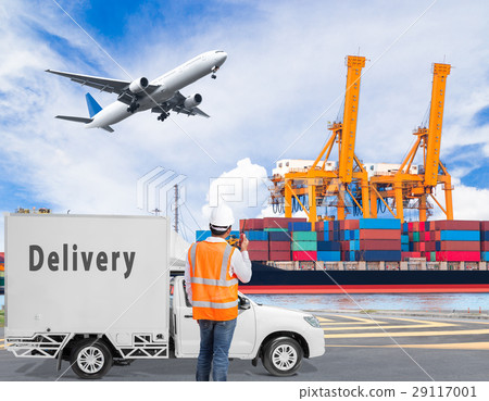 Port engineer talking on radio for logistic 29117001