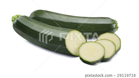 Whole zucchini and round pieces isolated on white Whole zucchini and round pieces isolated on white 29119718