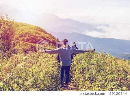 People hiking nature and mountains with Sunset lig 29120344