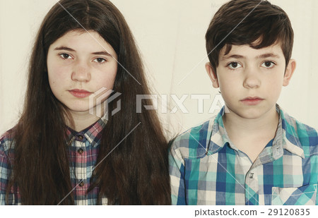 siblings preteen boy and teenager girl  29120835