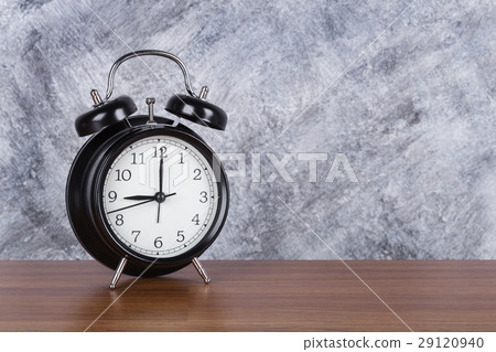 4 o'clock vintage clock on wood table and wall 4 o'clock vintage clock on wood table and wall 29120940