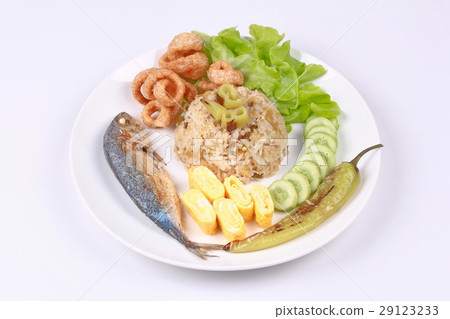 Fried jasmine rice in  green chili dip . 29123233