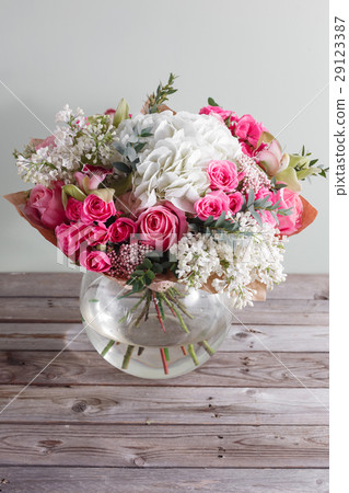 Luxury bouquet of different flowers in glass vase 29123387