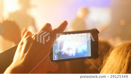 Fans hands recording video with smartphone at rock Fans hands recording video with smartphone at rock 29125349