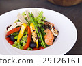 Salad with salmon on black table 29126161