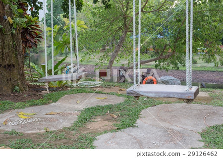 Old wooden swing two Nature seats hanging 29126462