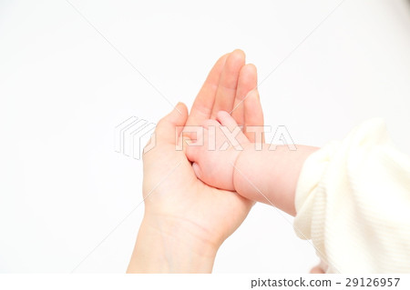 Mother touching infant hands Hand Mother touching infant hands Hand 29126957
