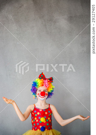 Funny kid clown playing indoor 29127405