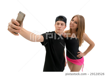 Young modern dance couple making selfie in studio Young modern dance couple making selfie in studio 29128526