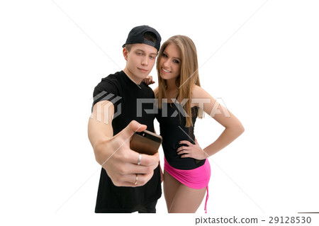 Young modern dance couple making selfie in studio 29128530
