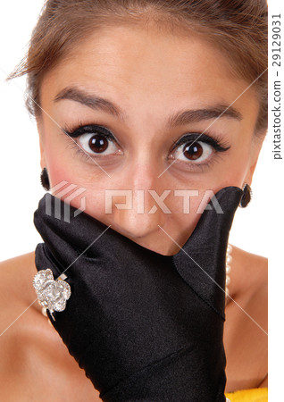 Closeup of face, mouth covered. Closeup of face, mouth covered. 29129031