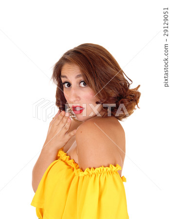 Surprised woman with hand over mouth. Surprised woman with hand over mouth. 29129051