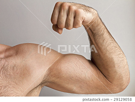 Man shows his strength Man shows his strength 29129058