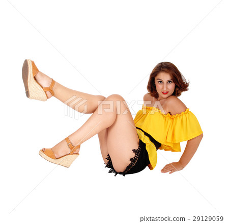 Beautiful woman sitting on floor. Beautiful woman sitting on floor. 29129059