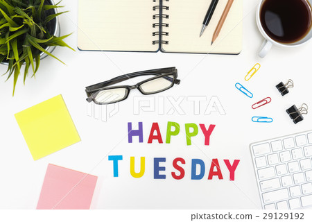 Office desk table with happy tuesday word Office desk table with happy tuesday word 29129192