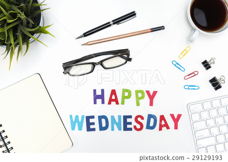 Office desk table with happy wednesday word 29129193